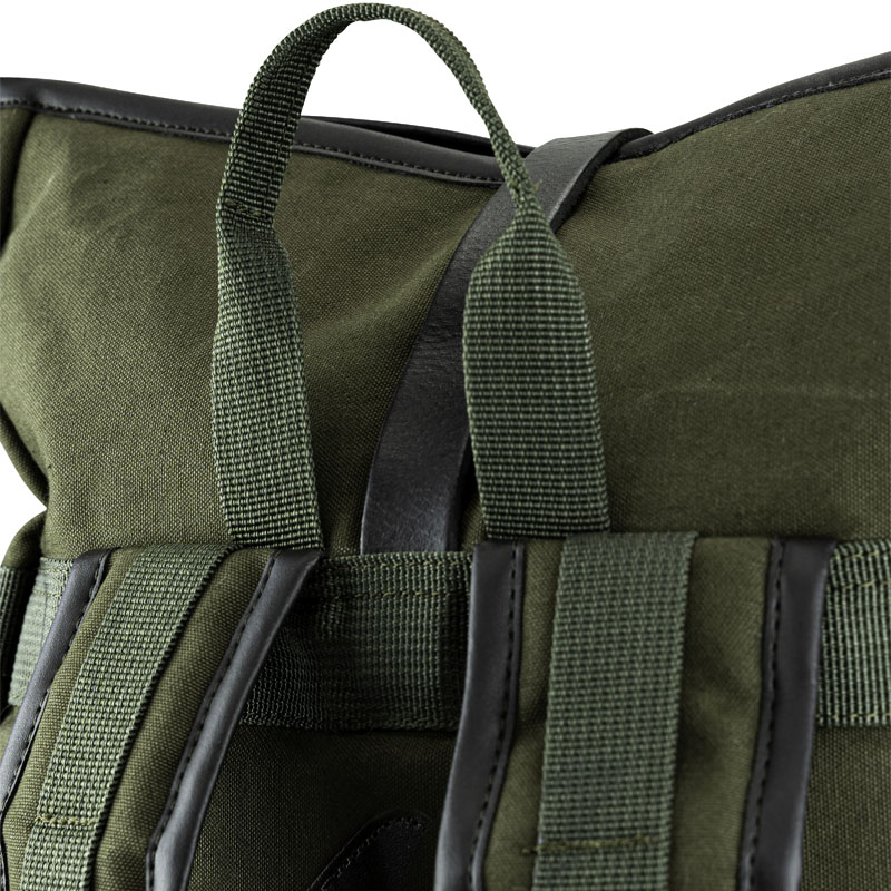 green heavy cotton canvas roll top backpack shoulder straps and handle detail